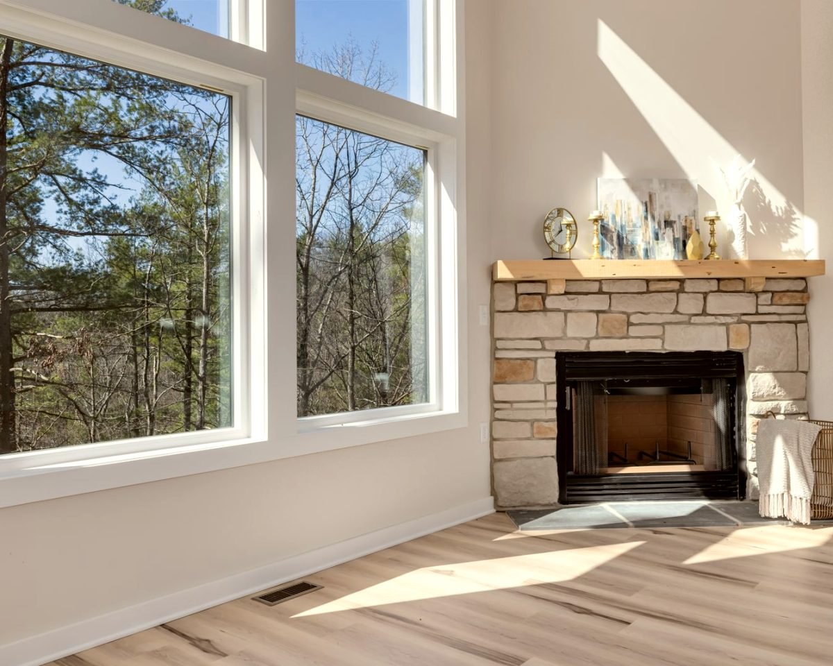 Living room before, with glare from a bare window